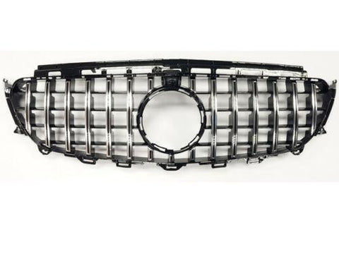 A car grille features vertical and horizontal chrome slats forming a grid pattern, with a circular emblem space in the center, set against a plain white background.