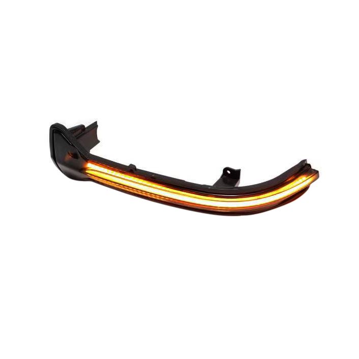 A curved car headlight with orange LED strips illuminates against a plain white background, showcasing its sleek design and modern technology. No text is visible.