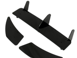A black car rear diffuser with three vertical fins, separated into one long center piece and two curved side pieces, displayed on a plain white background.