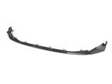 A black car front splitter with a sleek, curved design rests on a plain white background, featuring multiple mounting points along its length.