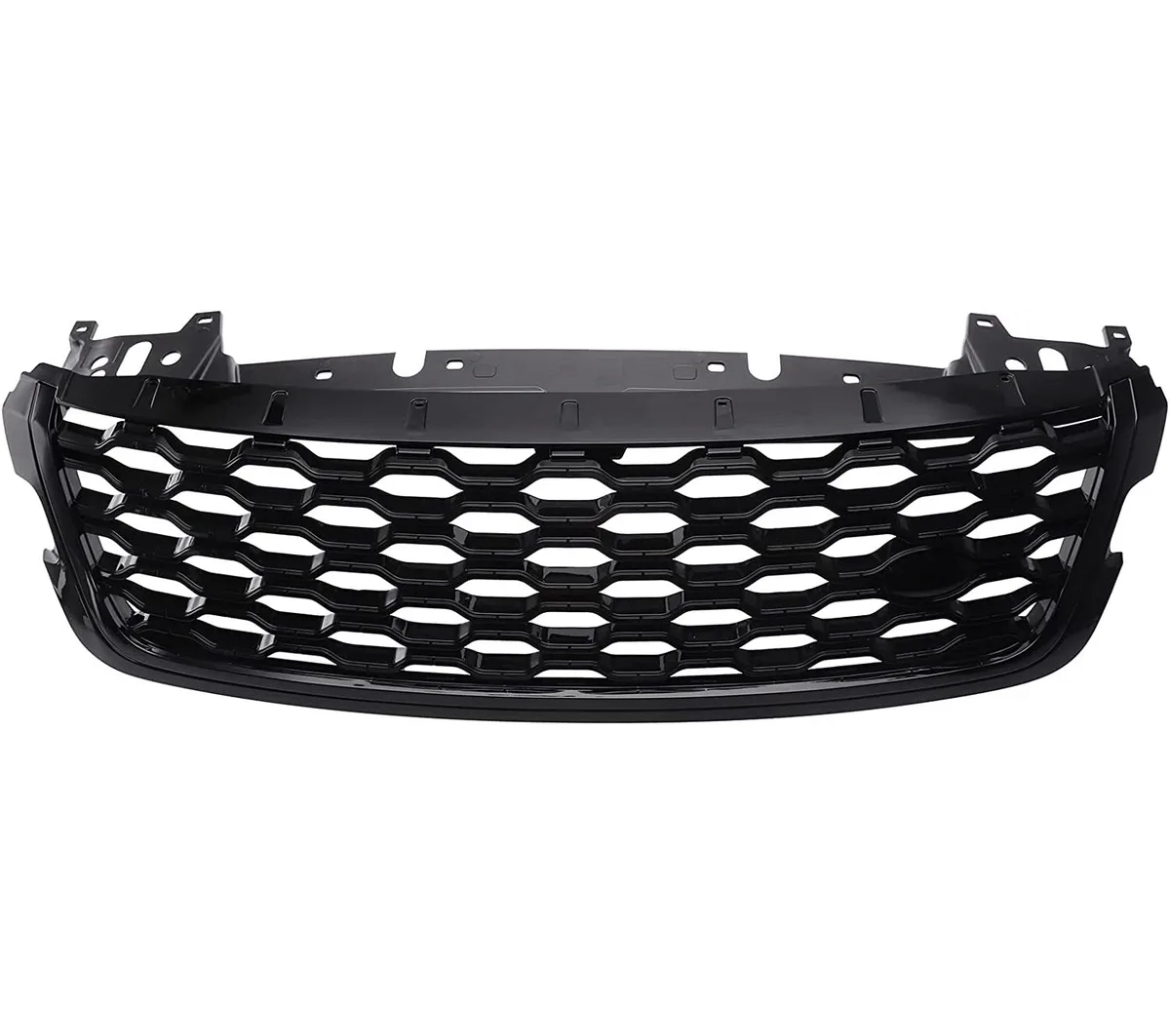 A black car grille with a honeycomb pattern is displayed against a plain white background, showcasing its sleek design and mounting points.