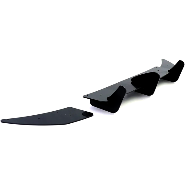 A set of black, aerodynamic fin-like car parts are laid on a white surface, suggesting components for performance vehicle modification or enhancement.