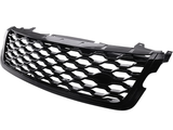 A black car grille with a hexagonal mesh pattern, shown against a white background, features mounting edges and a smooth, glossy finish.