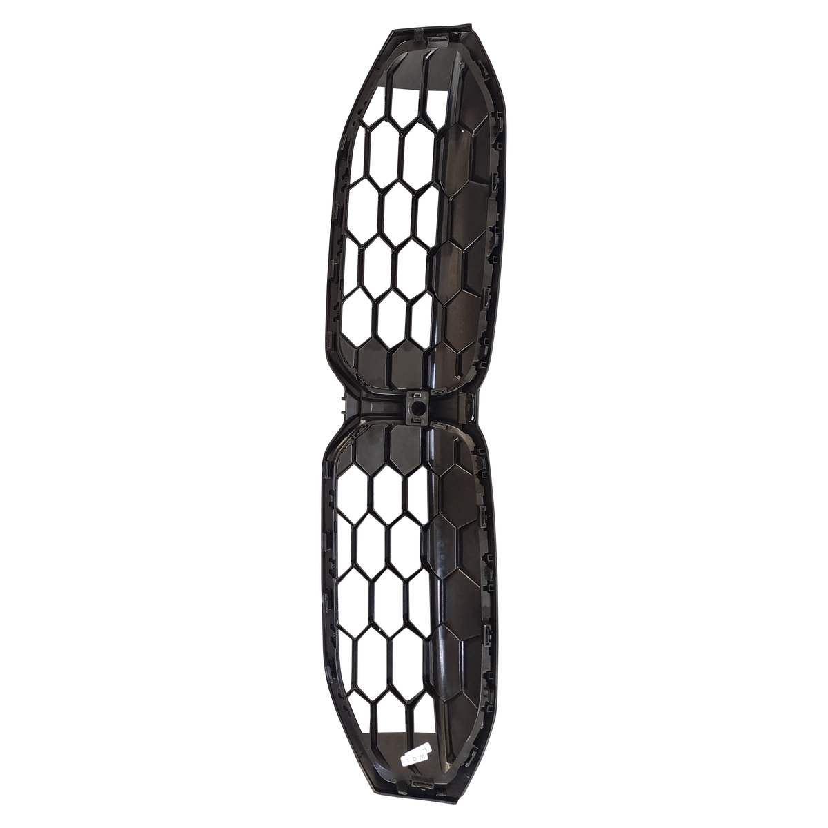 A black, hexagonal plastic car grille lies flat, segmented into two connected sections. It appears unused, positioned against a plain white background.