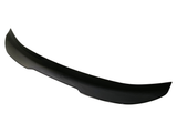 A glossy black car spoiler rests against a white background, its sleek, arched shape designed for aerodynamic enhancement.