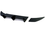 A black car splitter with mounting fins and a detached side wing segment, set against a plain white background.