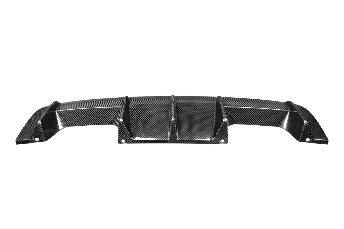Carbon fiber rear diffuser, featuring a sleek design with three vertical fins, lies against a plain white background, emphasizing its glossy surface and geometric pattern.