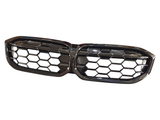 A black, dual-section car grille with a hexagonal mesh design is positioned against a plain white background.