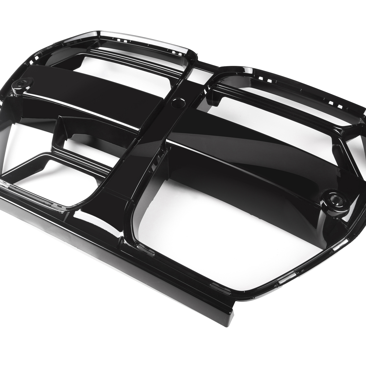 A black, glossy, plastic car grille lies on a white background. It features multiple elongated openings and a symmetrical design, designed for automotive airflow and aesthetic enhancement.