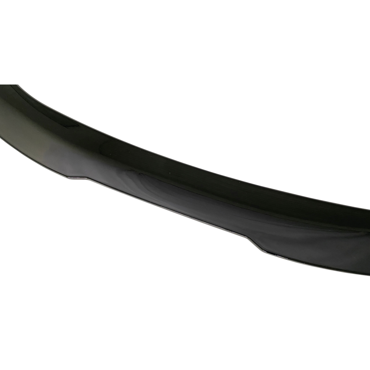 A glossy, black car bumper spoiler displayed against a white background, emphasizing its curved shape and sleek finish.