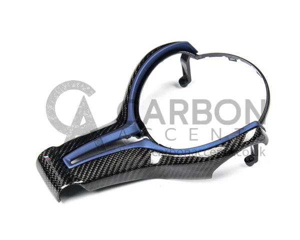 Carbon fiber car interior trim piece with a blue accent, designed for dashboard integration. The piece lies on a white background with "CARBON ACCENT" semi-transparent text overlay.