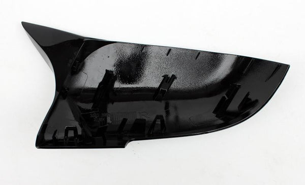 A black, fin-shaped plastic car part with attachment clips sits on a white background. Text on the surface reads: "260 30019R."