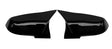 Two glossy black car mirror covers lay side by side on a white background, facing each other symmetrically. They are smooth and have a sleek, aerodynamic design.