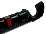 A black car bumper with a red rectangular section featuring twelve small circular lights, displayed against a plain white background.