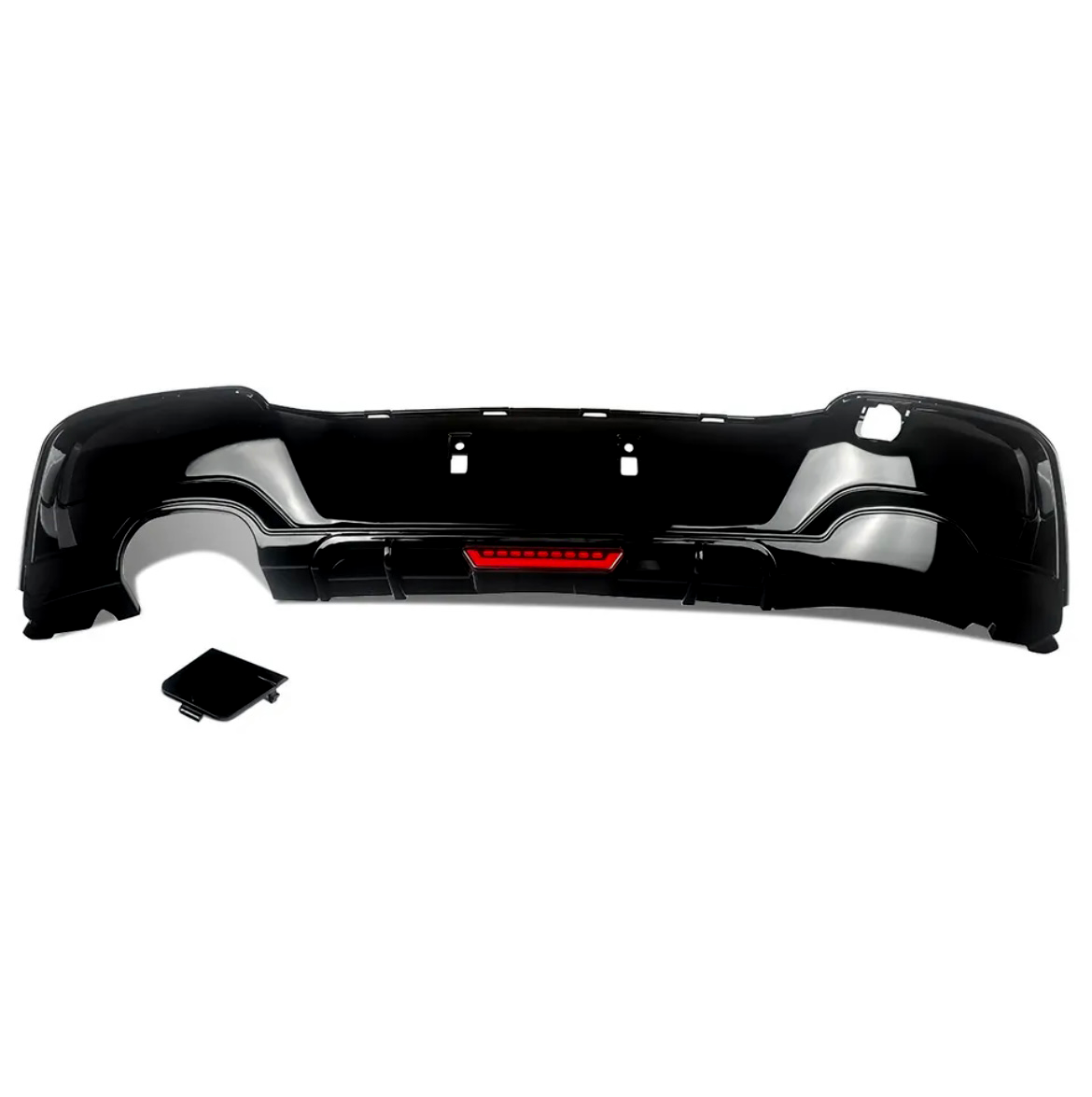 Black car bumper with a red reflector section, placed on a white background. A separate, matching black rectangular piece lies nearby, possibly a cover or attachment.