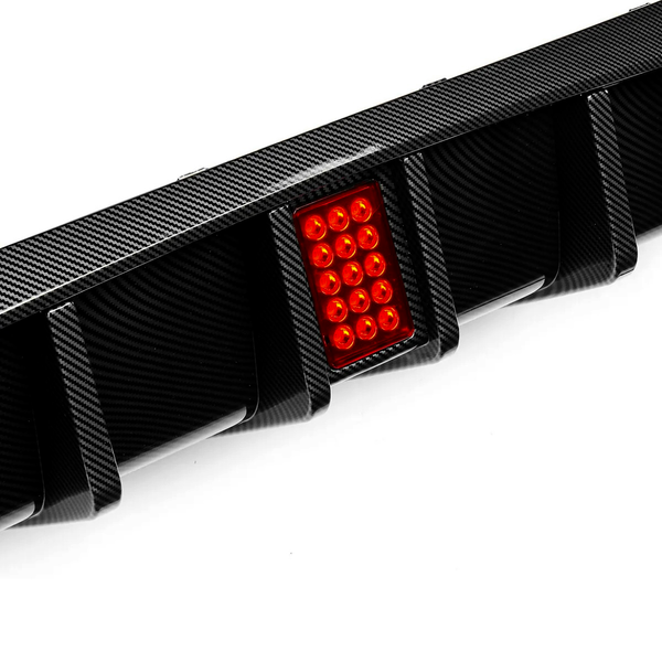 A carbon fiber car diffuser featuring a cluster of illuminated red LED lights, set against a plain white background.