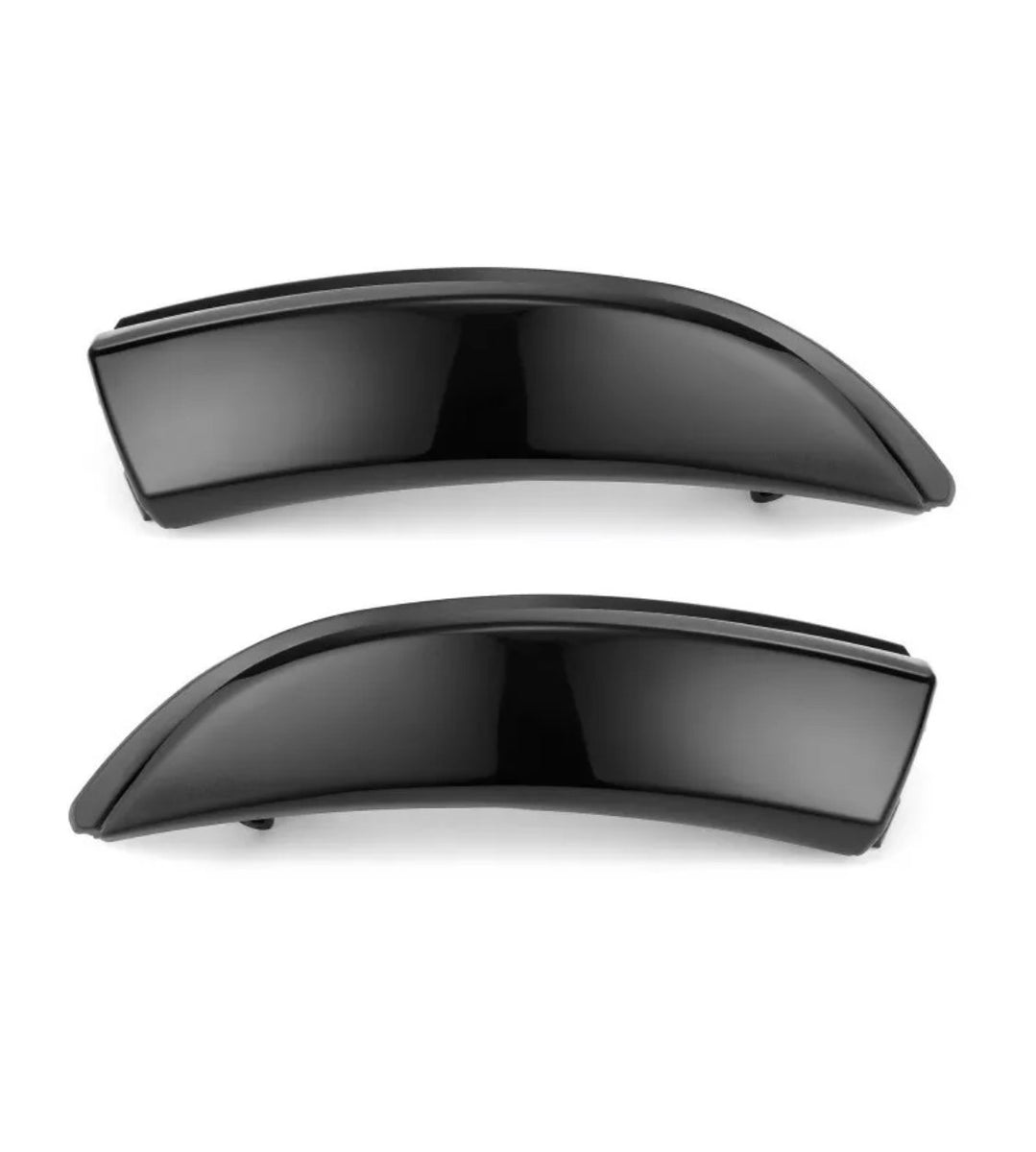Two sleek, black car fender flares are displayed horizontally against a plain white background, highlighting their smooth, curved design and glossy finish.