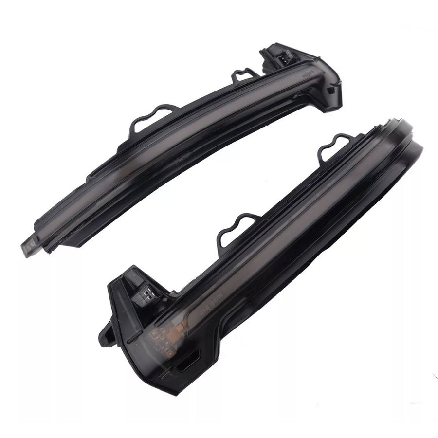 Two curved black LED car indicator lights rest side by side against a white background, featuring integrated connectors and mounting brackets for vehicle installation.