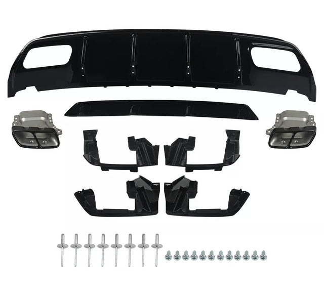 Car diffuser kit laid out; includes black diffuser panel, two metallic exhaust tips, multiple black mounting brackets, and a set of screws and rivets. Placed against a white background.