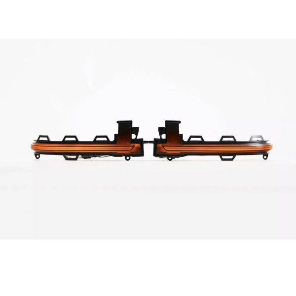 Two orange and black car light strips are positioned with a connecting joint between them. They are set against a plain white background, emphasizing their symmetrical design.
