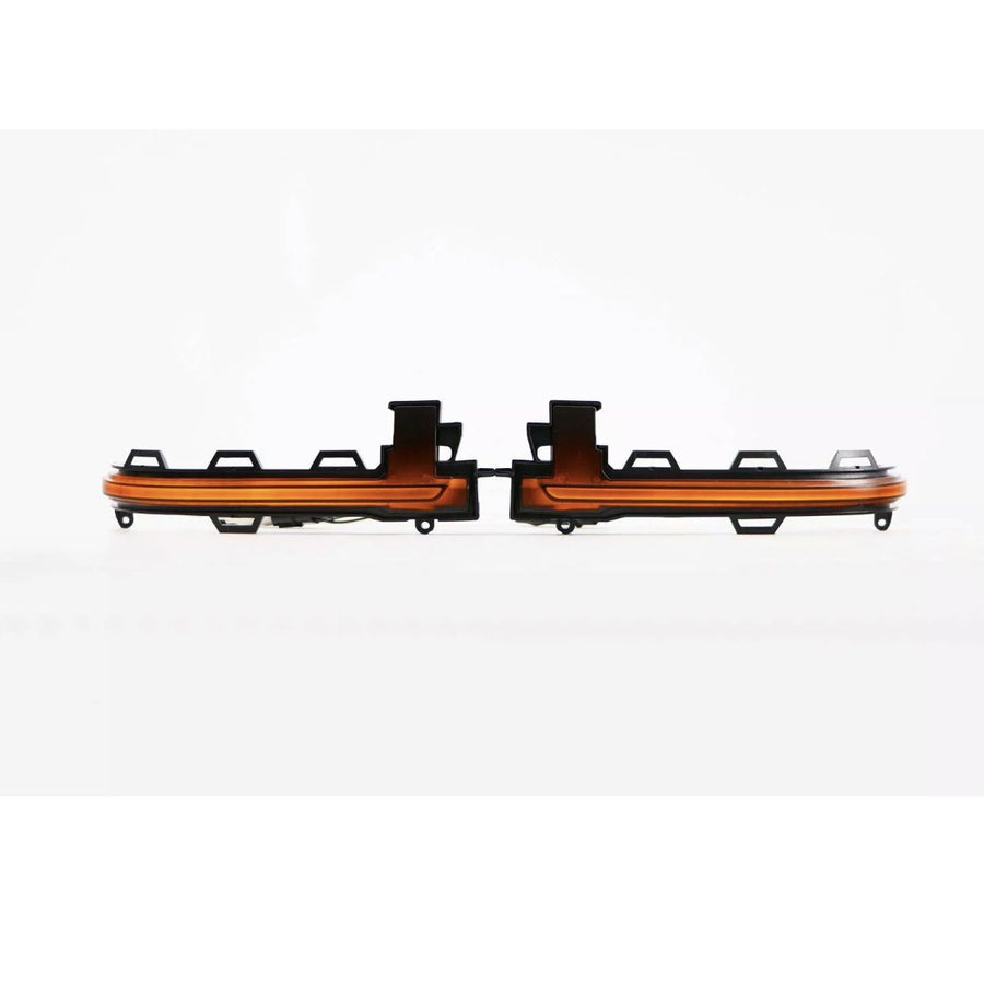 Two orange LED light strips are aligned side by side with black mounting brackets, set against a plain white background.