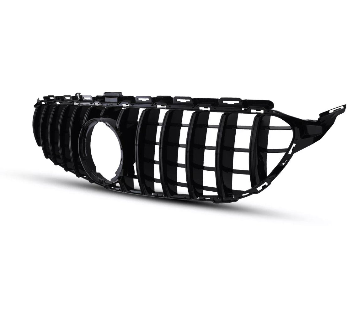 A black car grille with vertical slats and a circular central section, seen on a white background. It is designed to fit the front of a vehicle.