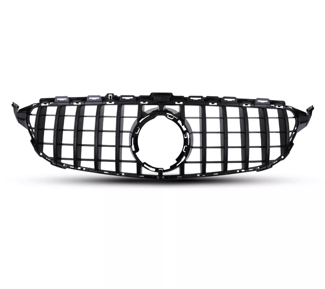 A black car grille with vertical and horizontal slats is positioned against a plain white background, featuring a central circular emblem space, suggesting automotive design.