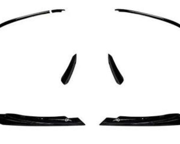 Black, glossy car spoilers and side skirts are arranged symmetrically on a white background, suggesting their use for a vehicle's aerodynamic enhancement.
