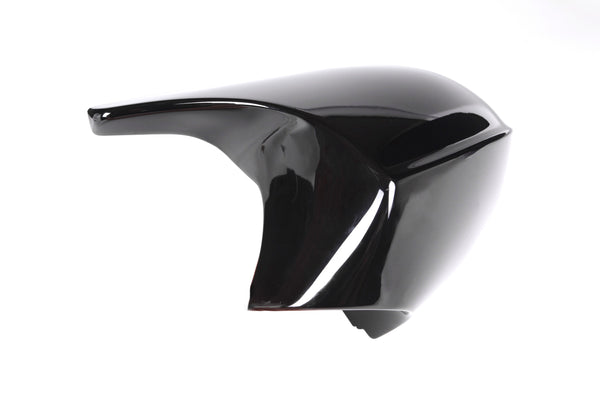 A sleek, black, glossy car mirror cover lies against a white background, showcasing its aerodynamic shape and smooth surface.