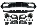 Car parts are laid out for assembly, including a black bumper diffuser, exhaust tips, and various mounting brackets. The components are organized neatly on a plain white background.