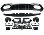 Car parts are laid out for assembly, including a black bumper diffuser, exhaust tips, and various mounting brackets. The components are organized neatly on a plain white background.